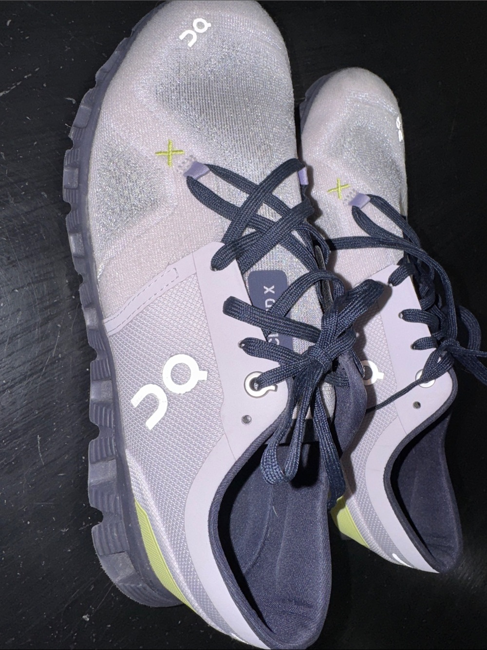 on cloud x 3. women’s size 9. light purple and navy blue. good used condition.
